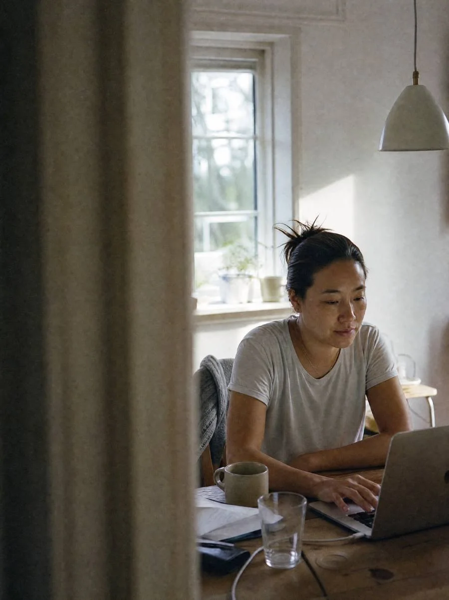 Person booking an appointment on a laptop.